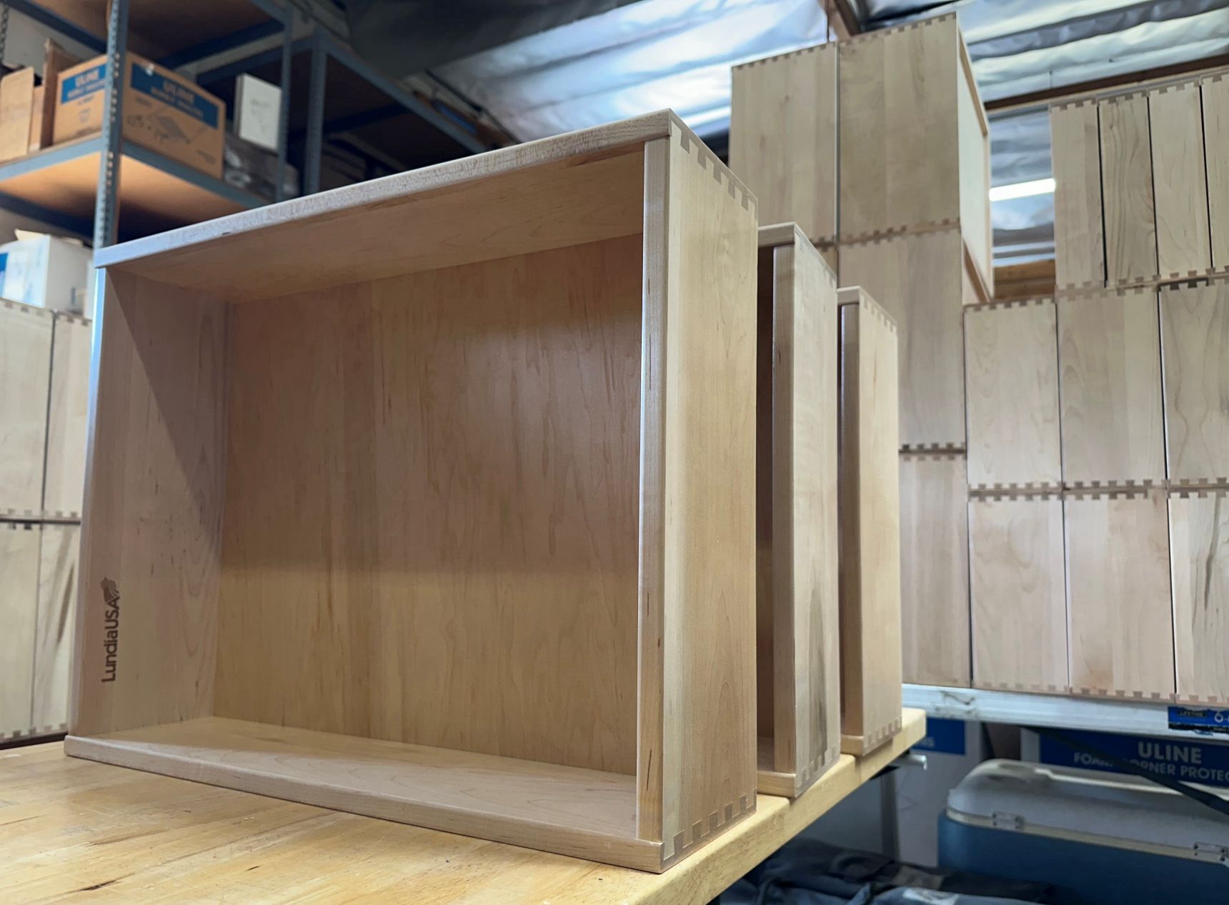 Solid wood English dovetailed drawer boxes in production