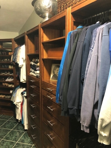 Customer photo of a Lundia closet in our Pecan finish